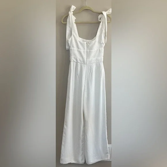 Alexis Lincoln Bow Jumpsuit in white with Polka Dot print Size medium